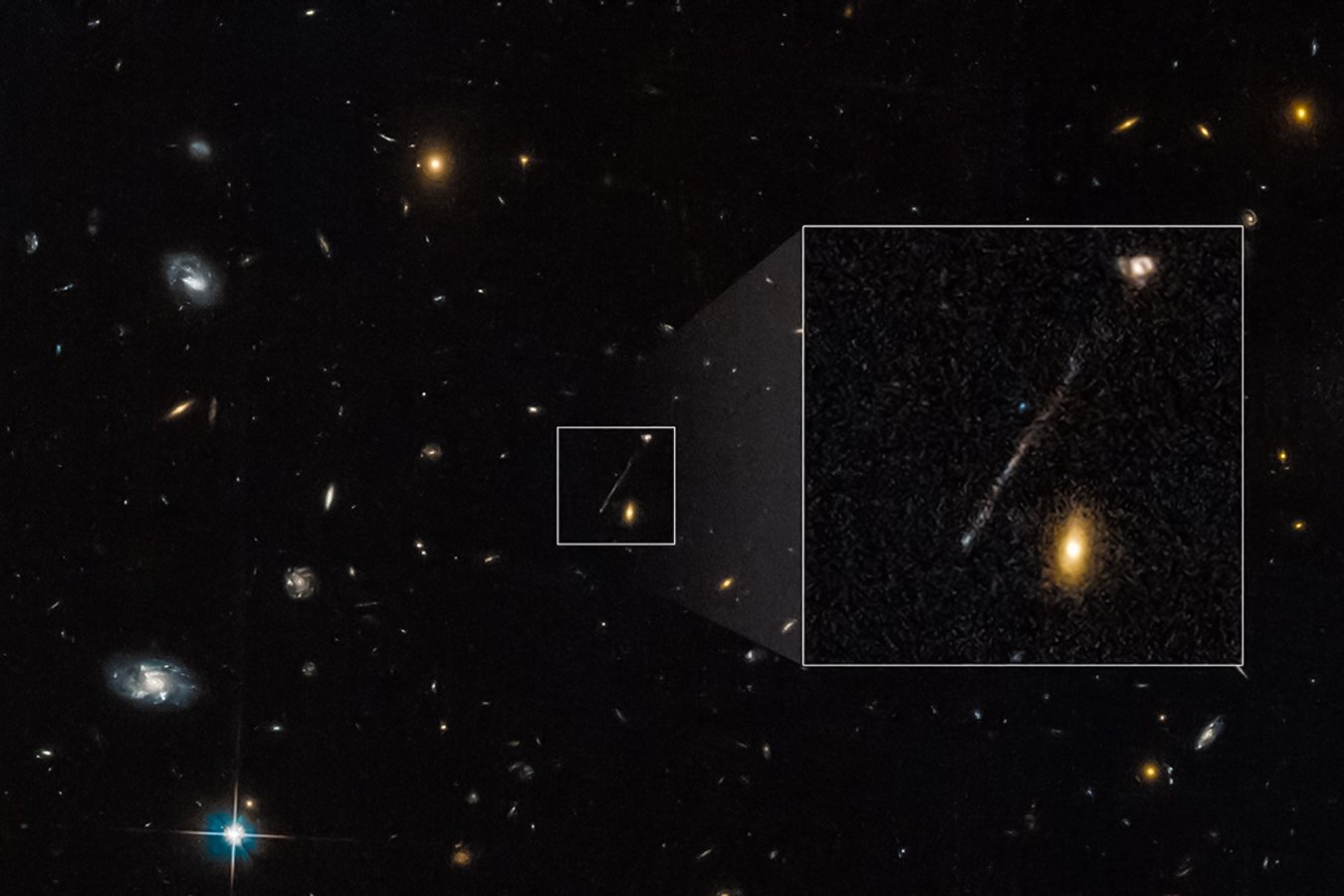 Hubble image of the field around RBH-1, with an inset zooming in on the thin streak of young stars trailing the runaway black hole.